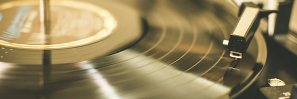 close up of a vinyl record on a record player 