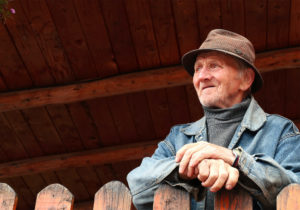 older man wearing hat